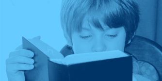 Boy reading book