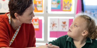 Communication partner speaking with an AAC user