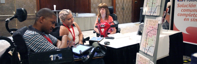 Three people using AAC