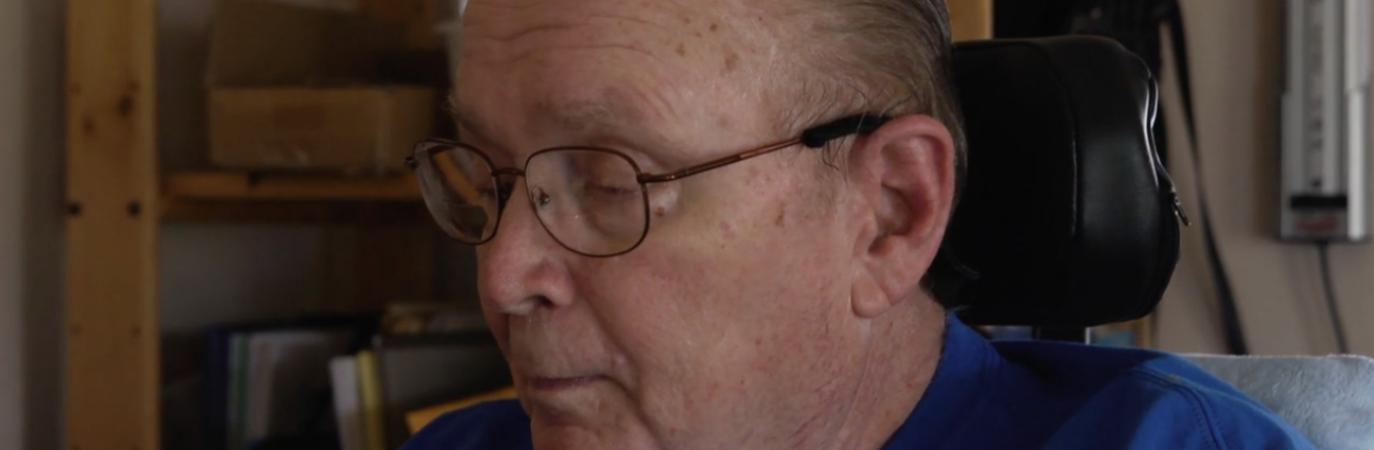 Elderly man sitting