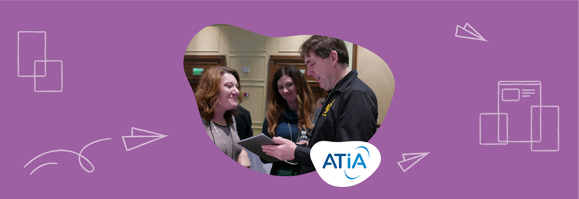 3 people talking at the ATIA conference talking to each other. The visual is set on a purple background and ATIA's logo in the middle.