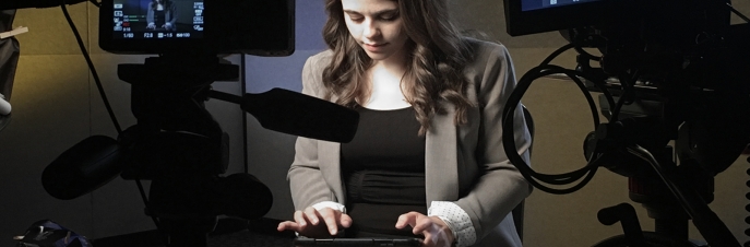 Girl typing on an iPad