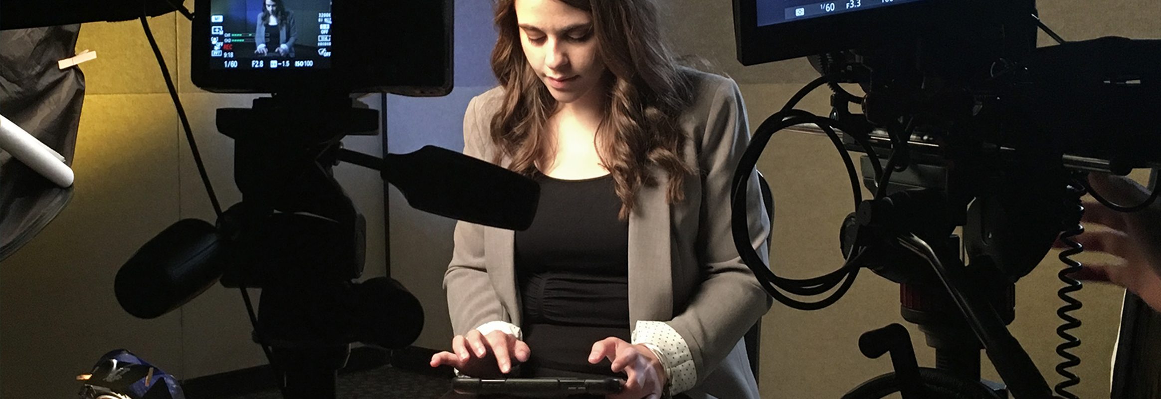 Girl typing on an iPad