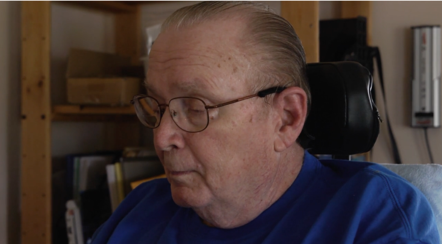 Elderly man sitting