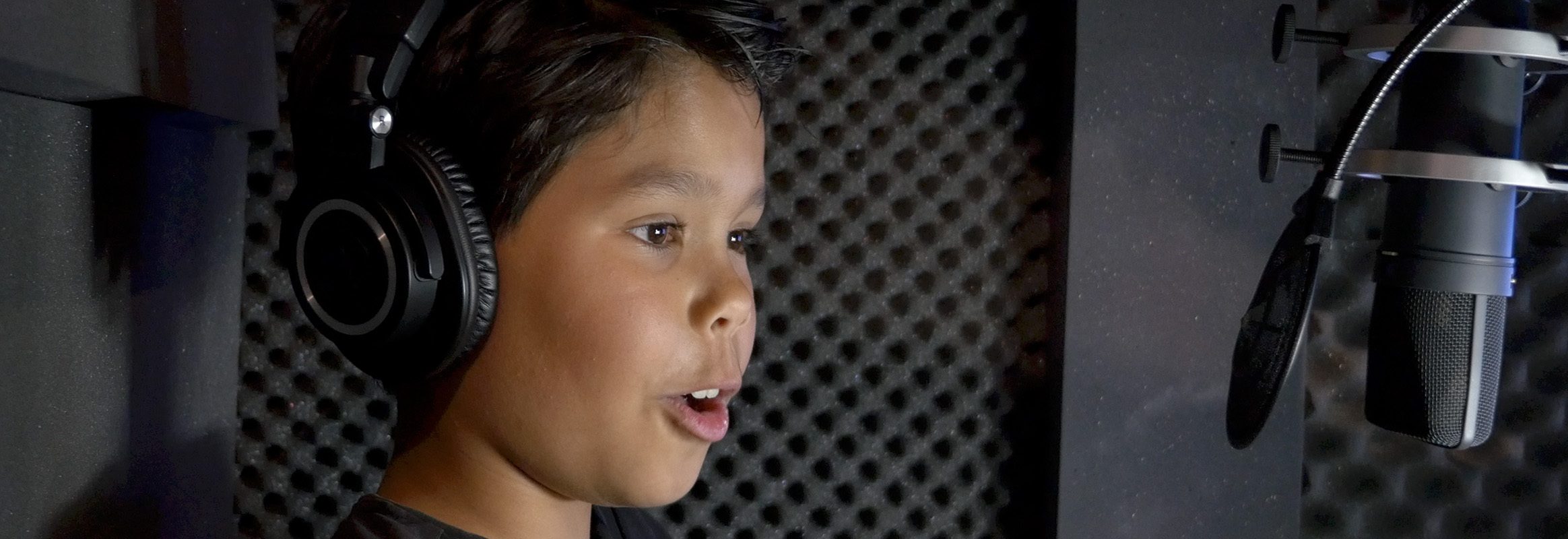 Boy in a recording studio