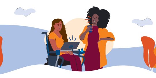 Two black women talking. One is in wheel chair using an iPad to talk. The other one is standing, chatting with the wheelchair user and holding a cup