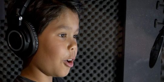 Boy in a recording studio