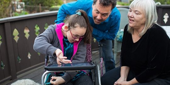 Girl talking using her iPad